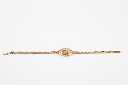 LONGINES lady's wristwatch in gold 585 thousandths....