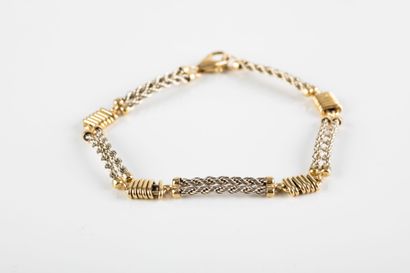 Gold bracelet composed of rectangular braided...
