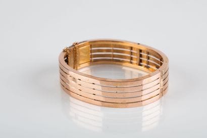 Large bracelet in pink gold, rigid, composed...
