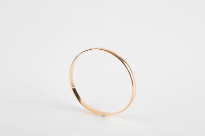 Solid yellow gold bracelet. Interior dimension:...