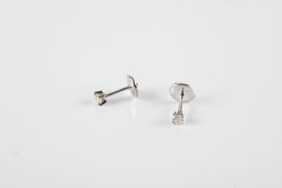 Pair of ear studs each with a diamond for...