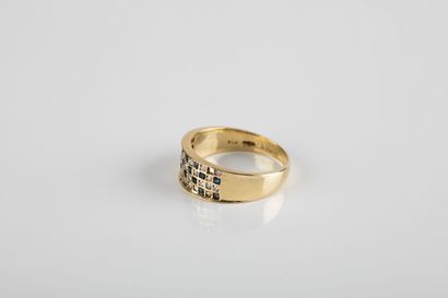 Yellow gold checkerboard ring set with diamonds...