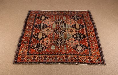 Antique wool carpet with knotted stitches...