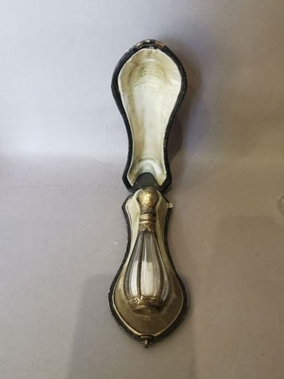 TWO SALT BOTTLES, mounted in silver gilt....