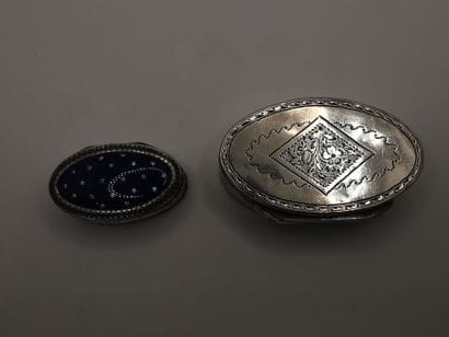 TWO silver, enamel and silver gilt boxes.
-...