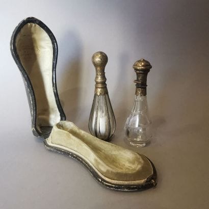 TWO SALT BOTTLES, mounted in silver gilt....