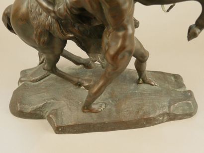 D'après COUSTOU
Cheval de Marly et écuyer
Bronze...