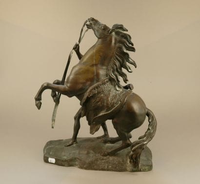 D'après COUSTOU
Cheval de Marly et écuyer
Bronze...
