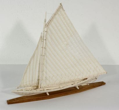 Model of a bone whaleboat shown under sail....