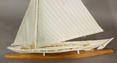Model of a bone whaleboat shown under sail....