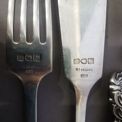 SERIES OF ELEVEN COUVERTS AND A FISH FOURCHETTE...