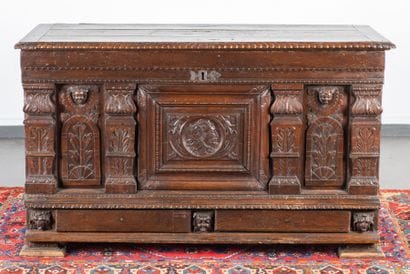 Large molded and carved oak chest, featuring...