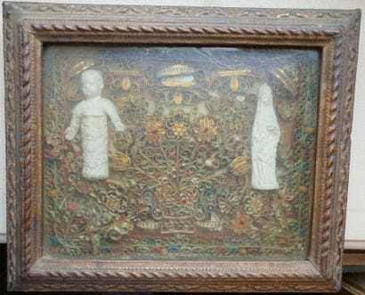 Frame of polychrome and gilded paperolles...