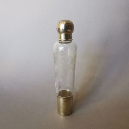 LIQUEUR BOTTLE in crystal and silver gilt...