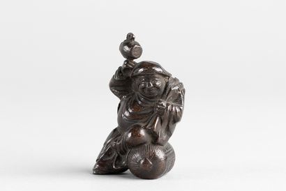Statuette representing one of the seven Gods...