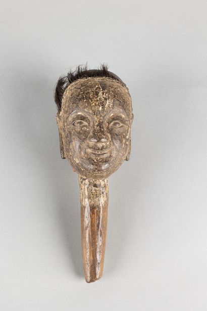 Antique puppet head depicting a human face....