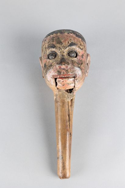 Antique puppet head depicting a human face....