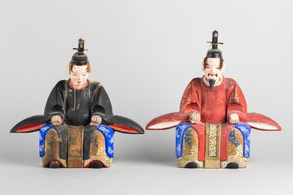 Two dolls representing the minister on the...
