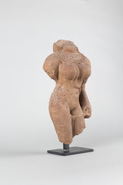 Apsara. Acephalous statue representing a...