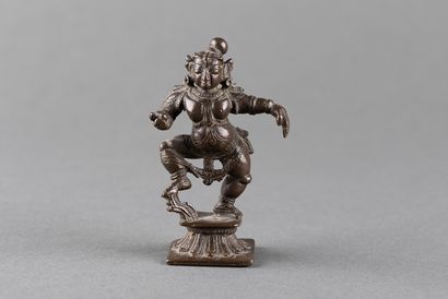 Vishnu represented standing in the form of...