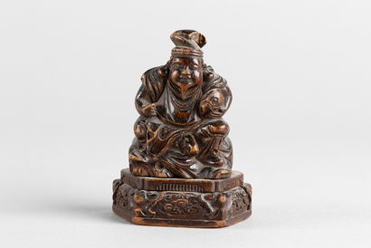 Statuette representing one of the seven Gods...