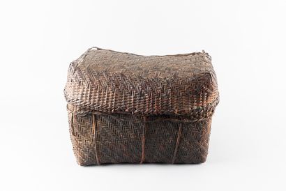 A travel box or shaman's case in woven willow...