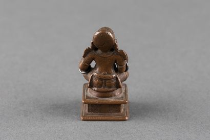Female Vichnu deity depicted seated on a...