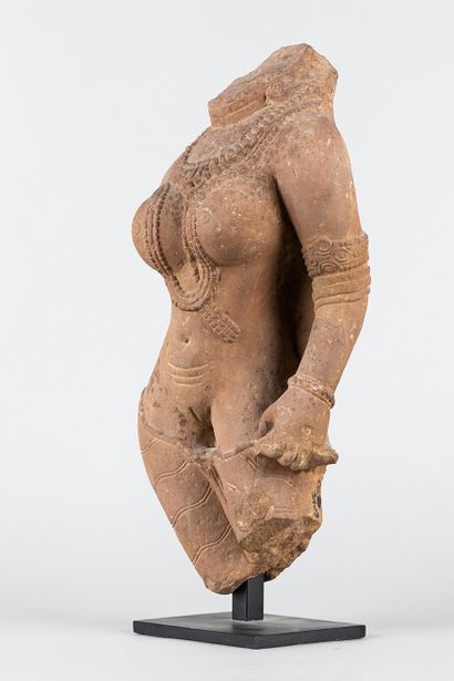 Apsara. Acephalous statue representing a...