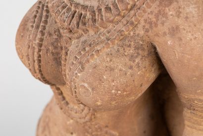 Apsara. Acephalous statue representing a...
