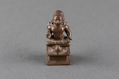 Female Vichnu deity depicted seated on a...