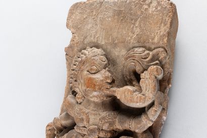 Relief depicting a musician playing a wind...