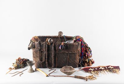 A travel box or shaman's case in woven willow...