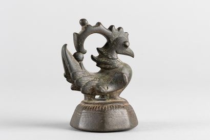 Large weight used to weigh opium. Representation...