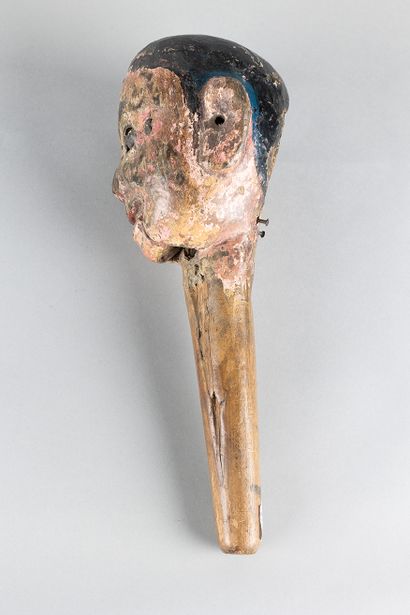 Antique puppet head depicting a human face....