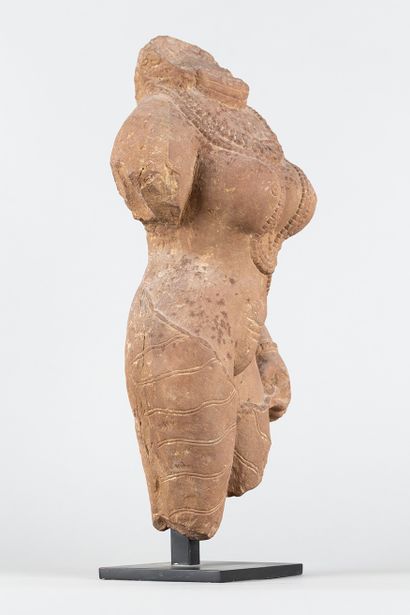 Apsara. Acephalous statue representing a...