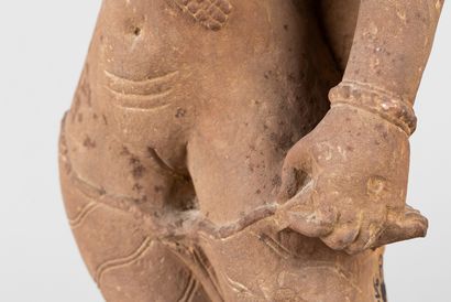 Apsara. Acephalous statue representing a...
