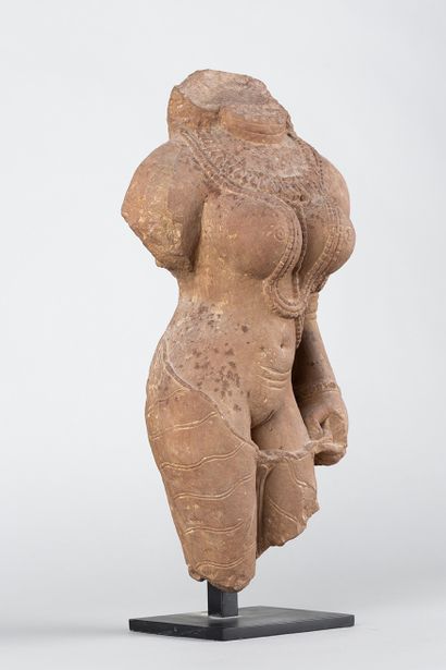 Apsara. Acephalous statue representing a...