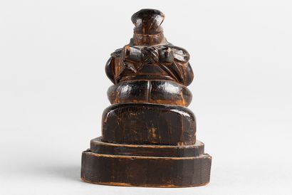Statuette representing one of the seven Gods...