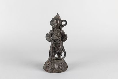 Wei two. Statue of a warrior god standing...