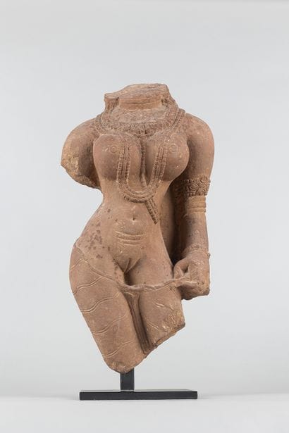 Apsara. Acephalous statue representing a...