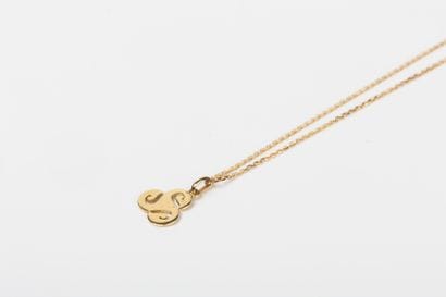 Yellow gold forcat chain with triskel pendant...