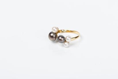 Yellow gold ring set with white cultured...