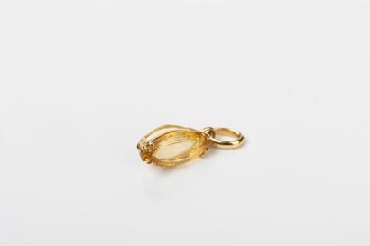 Yellow gold pendant set with a navette-cut...