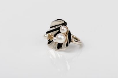 White gold lotus leaf ring set with four...