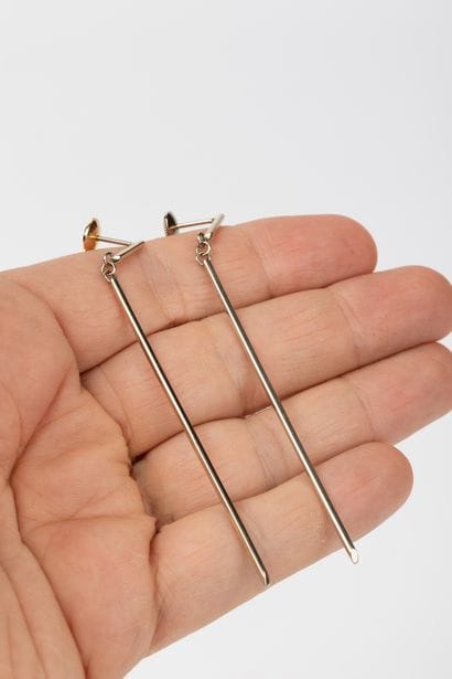 Pair of dangling earrings in white gold,...