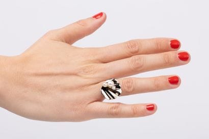 White gold lotus leaf ring set with four...