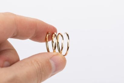 Yellow gold ring forming a spiral. TD51 
Weight...