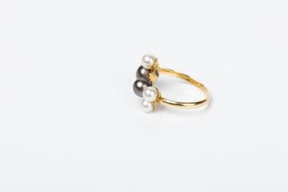 Yellow gold ring set with white cultured...