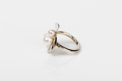 White gold lotus leaf ring set with four...
