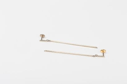 Pair of dangling earrings in white gold,...